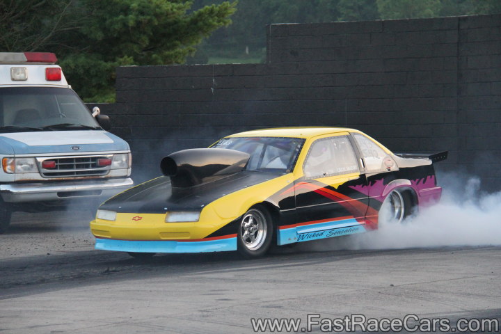 Colorful Beretta Drag Car Doing Burnout